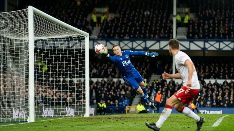 Jordan Pickford net worth 2026 Everton goalkeeper action shot