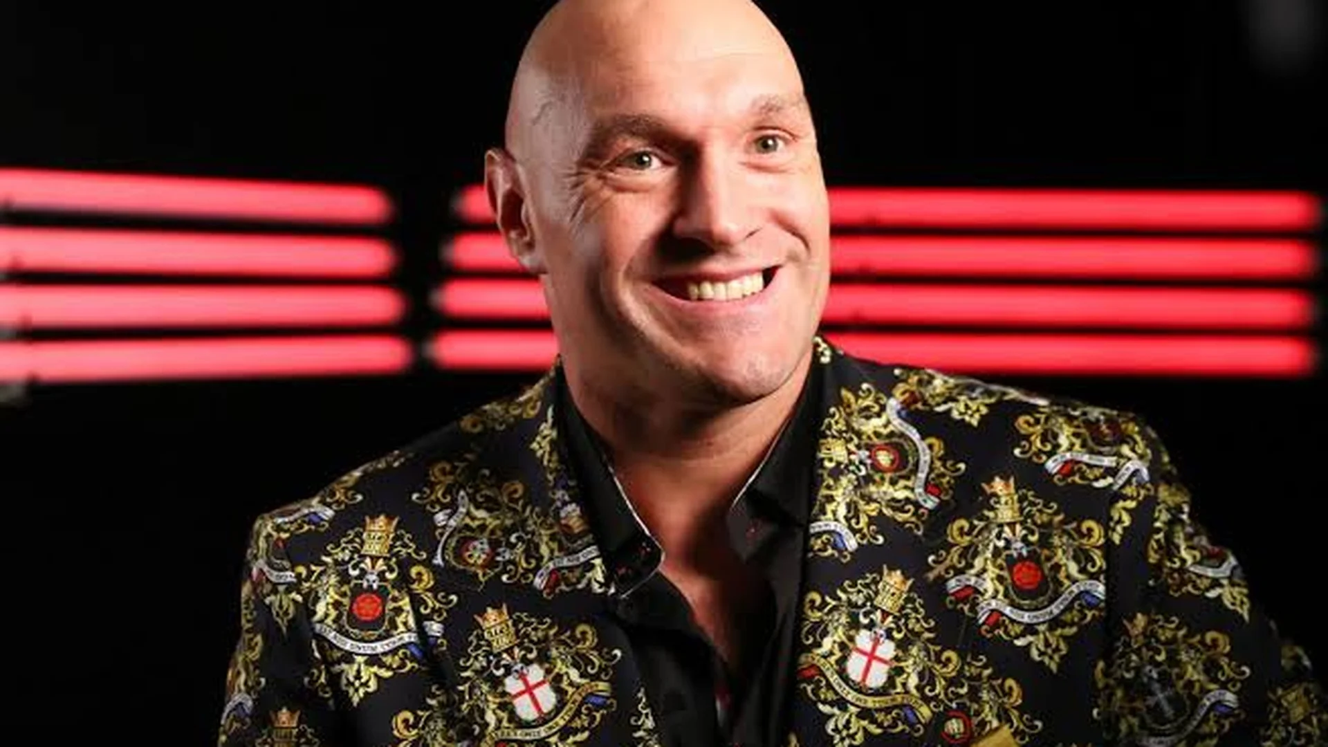 Tyson Fury net worth boxer celebrating a heavyweight title win
