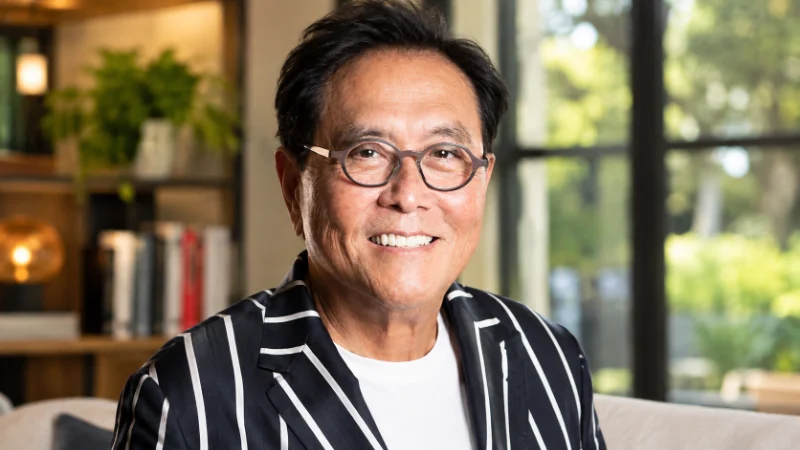 Books representing Robert Kiyosaki net worth from publishing royalties